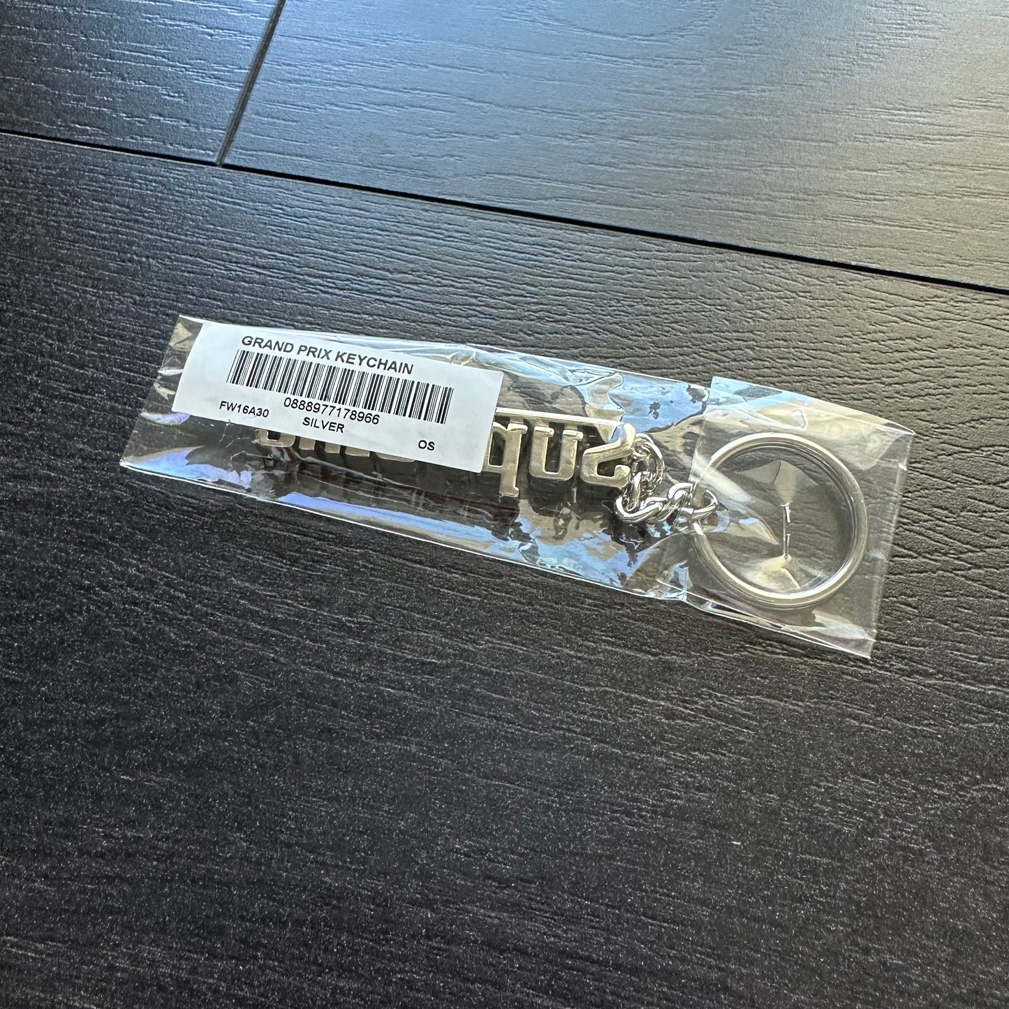 Supreme Grand Prix Keychain